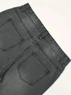 Men's casual jeans by Nova Mart with anime star patch, featuring front pockets and a relaxed fit in a denim style.