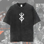 Men's Berserk anime graphic T-shirt in washed oversized streetwear style, featuring bold character artwork on the front.