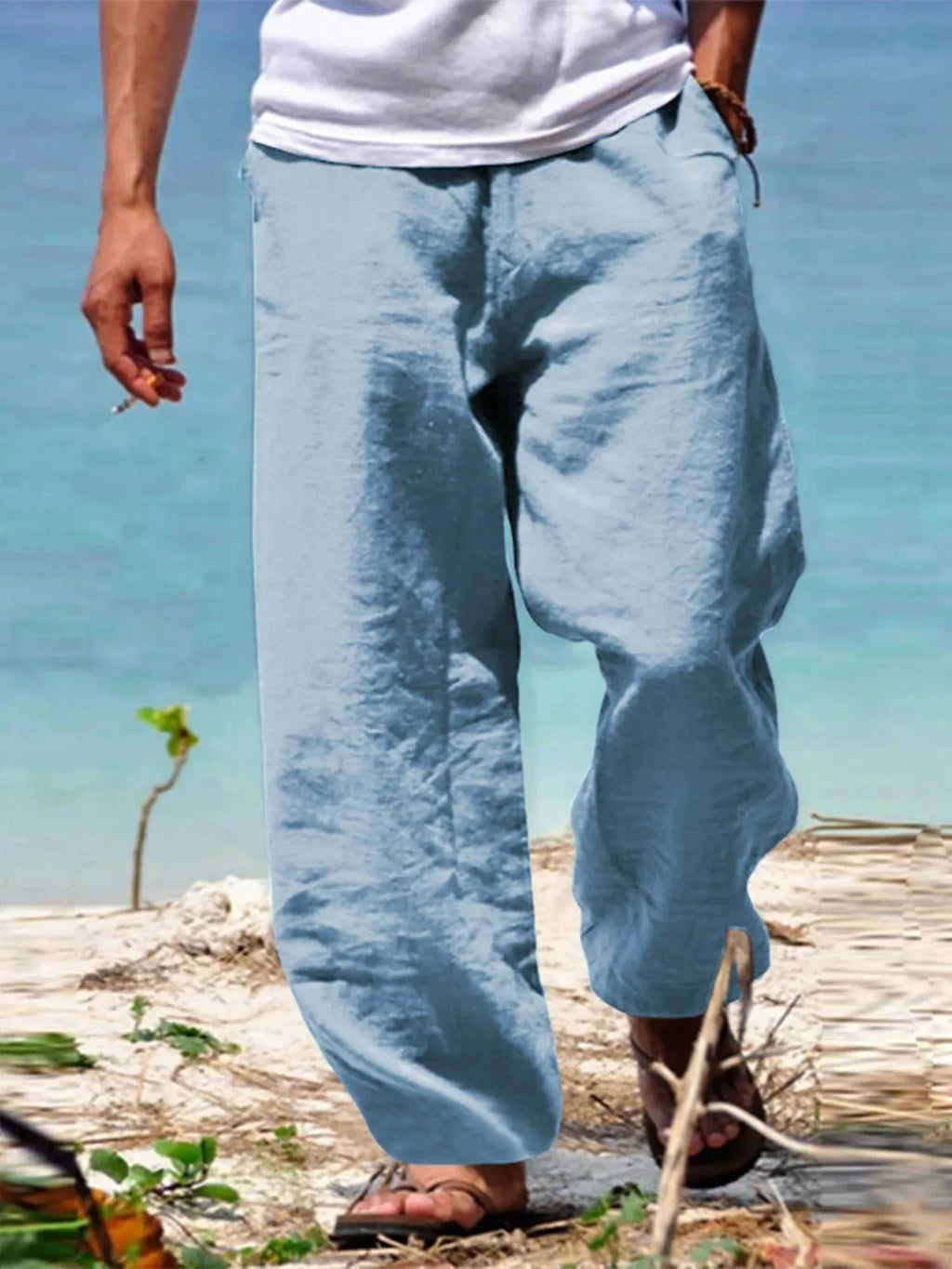 Men's linen blend pants with elastic waist and relaxed fit, casual beachwear by Nova Mart, shown in light fabric and comfortable style.