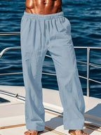 Men's linen blend pants with elastic waist and relaxed fit, ideal for beach casual wear by Nova Mart.