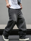 Men's Nova Mart micro flared wide-leg jeans with loose straight fit and pleated denim design, shown in a stylish fashion pose.