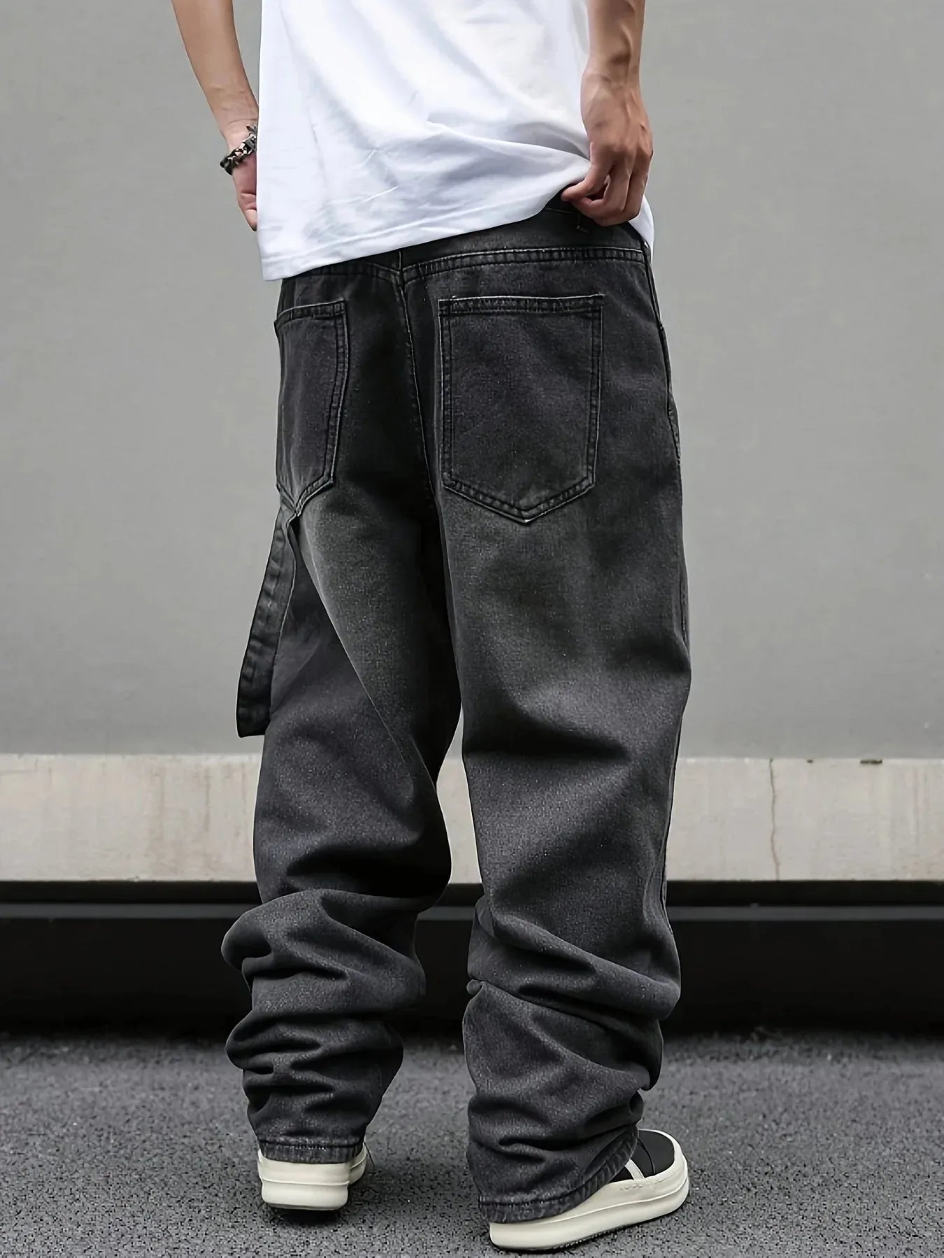 Men's Nova Mart micro flared wide leg jeans with loose straight fit and pleated denim, showcasing the relaxed, stylish design.