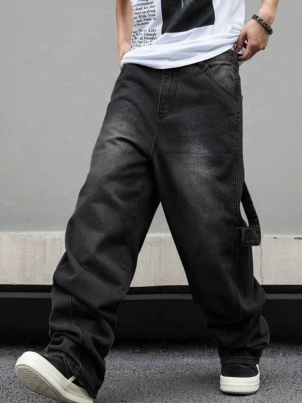 Men's Nova Mart micro flared wide-leg jeans with loose straight fit and pleated denim detail, displayed on a model.