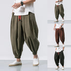 Men's loose linen harem pants by Nova Mart, oversized and relaxed fit, shown in natural linen fabric with a casual style.