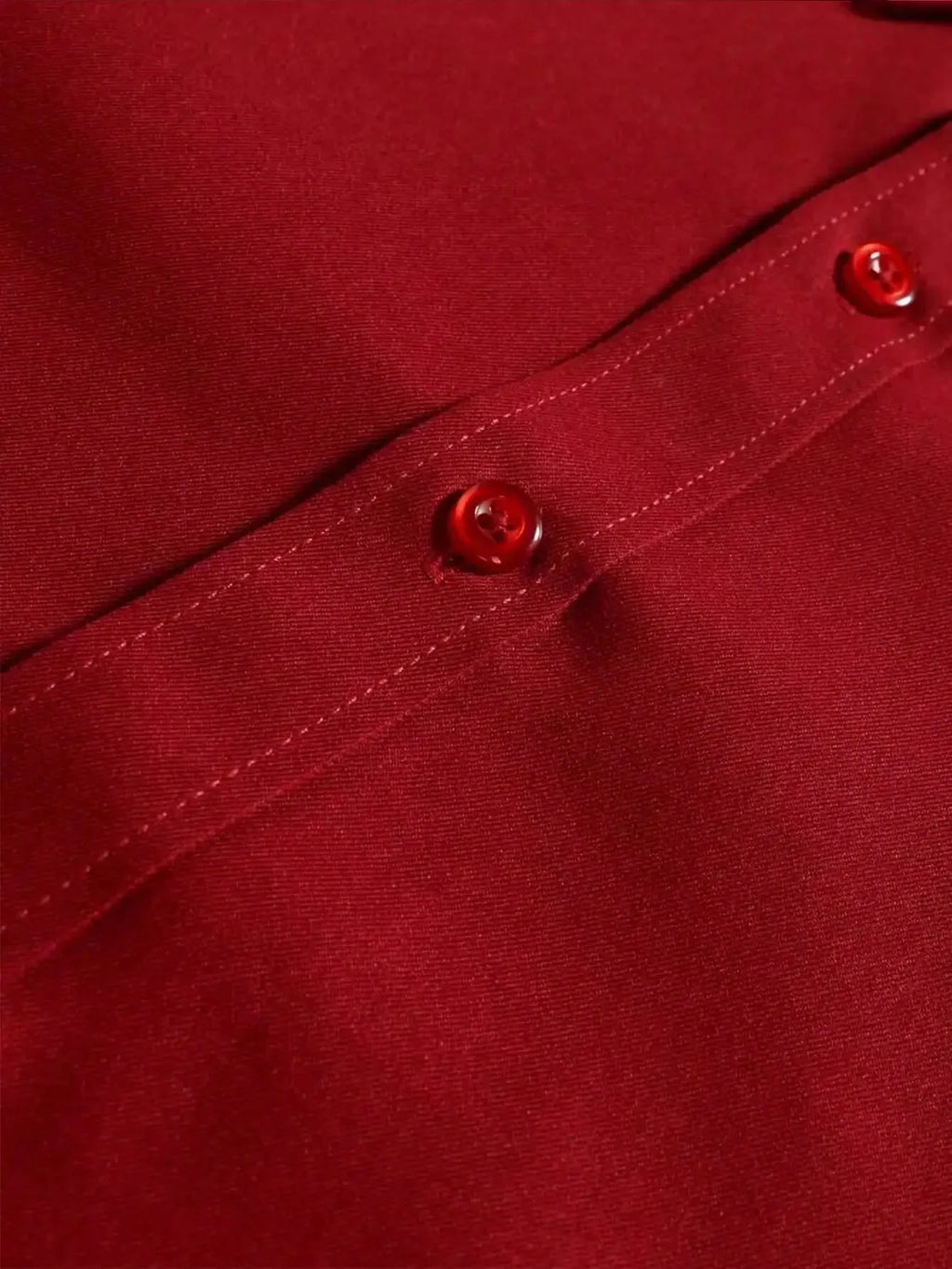 Men's red formal dress shirt with long sleeves by Nova Mart, showing the front view with collar and button details.