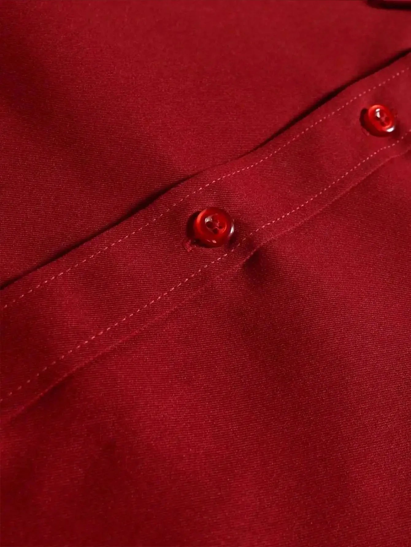 Men's red formal dress shirt with long sleeves by Nova Mart, showing the front view with collar and button details.