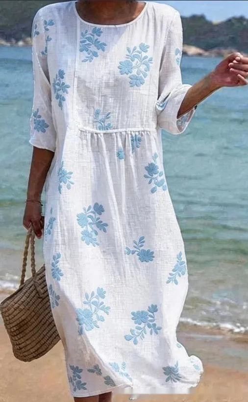 Floral art print casual resort dress by Nova Mart, featuring a vibrant floral pattern and lightweight fabric for warm weather.