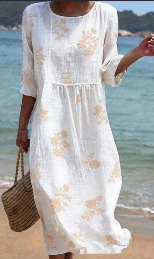 Floral art print casual resort dress by Nova Mart featuring vibrant flower patterns and lightweight fabric for warm weather.
