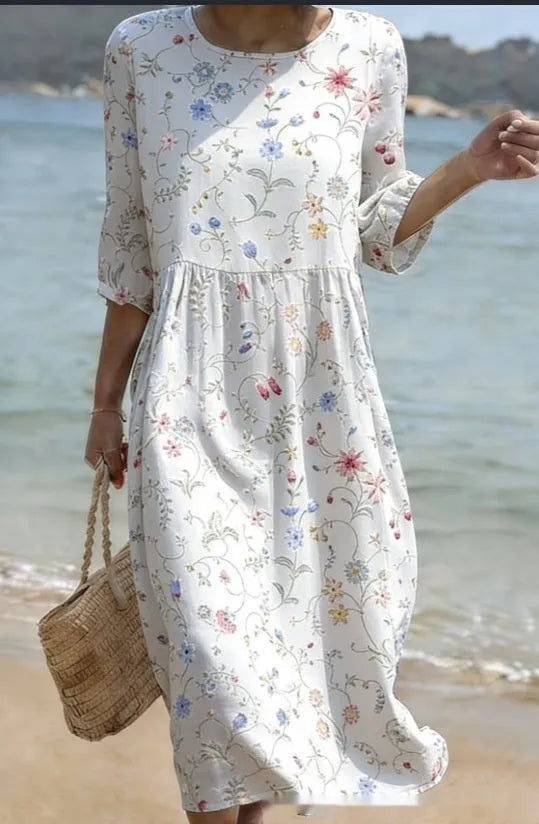 Floral art print casual resort dress from Nova Mart featuring vibrant floral patterns and relaxed fit.