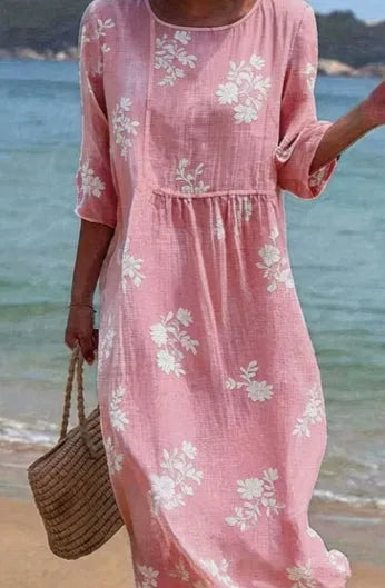Floral art print casual resort dress by Nova Mart, lightweight fabric, with a relaxed fit and vibrant floral pattern.