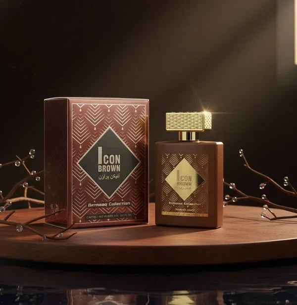 Icon Brown perfume bottle and packaging on a wooden surface with a dark background