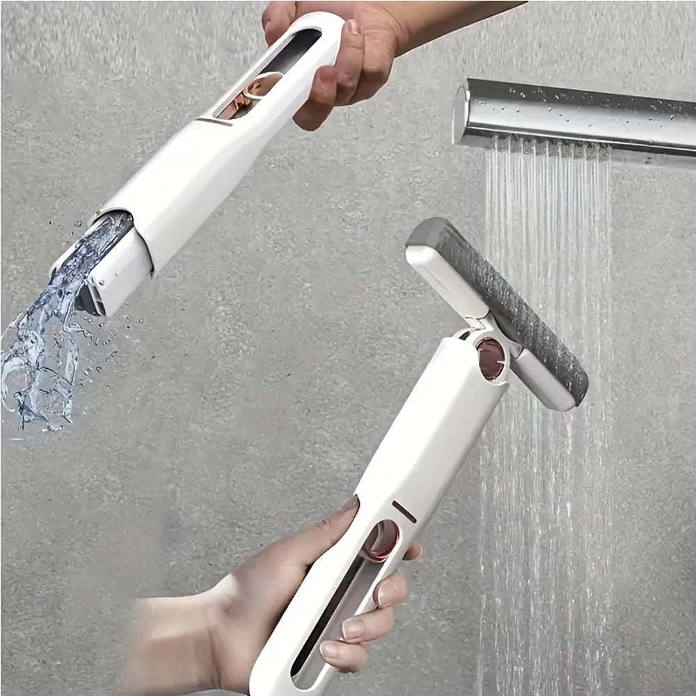 Portable Nova Mart self-squeeze mini mop for desktop cleaning, with a compact design and cleaning cloth attached.
