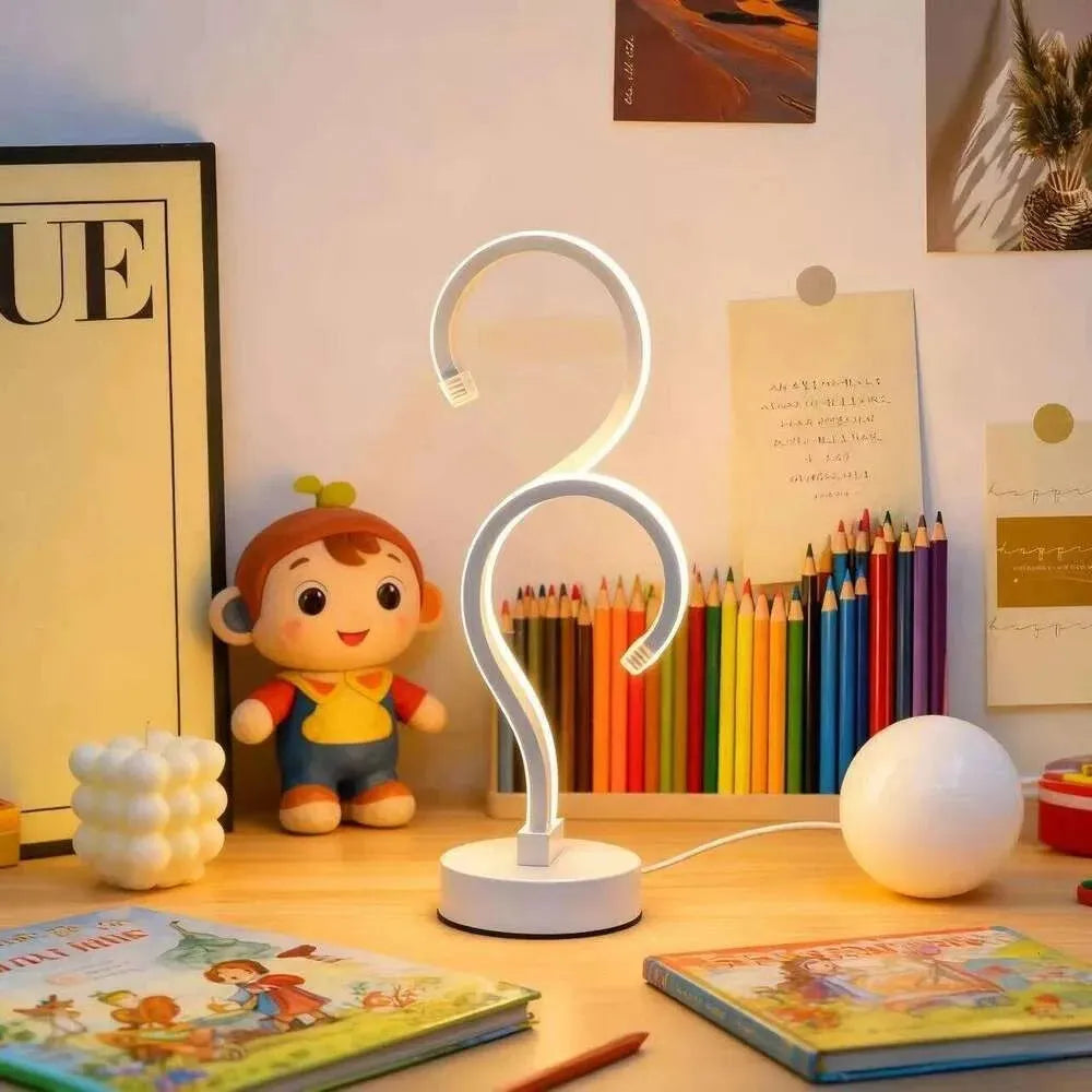 Question Mark LED desk lamp by Nova Mart with 3-color adjustable lighting, USB-powered bedroom light, and unique question mark design.