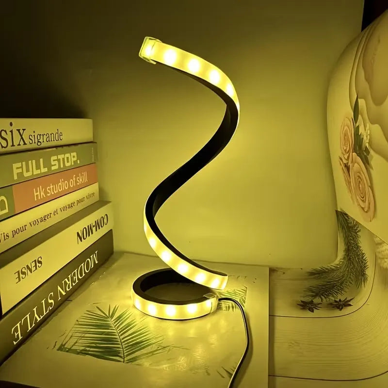 Two spiral LED desk lamps from Nova Mart with 3-color dimmable, eye-friendly lighting, shown on a modern workspace.