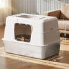 Stainless steel enclosed cat litter box by Nova Mart with a lid and door for odor control and easy cleaning.