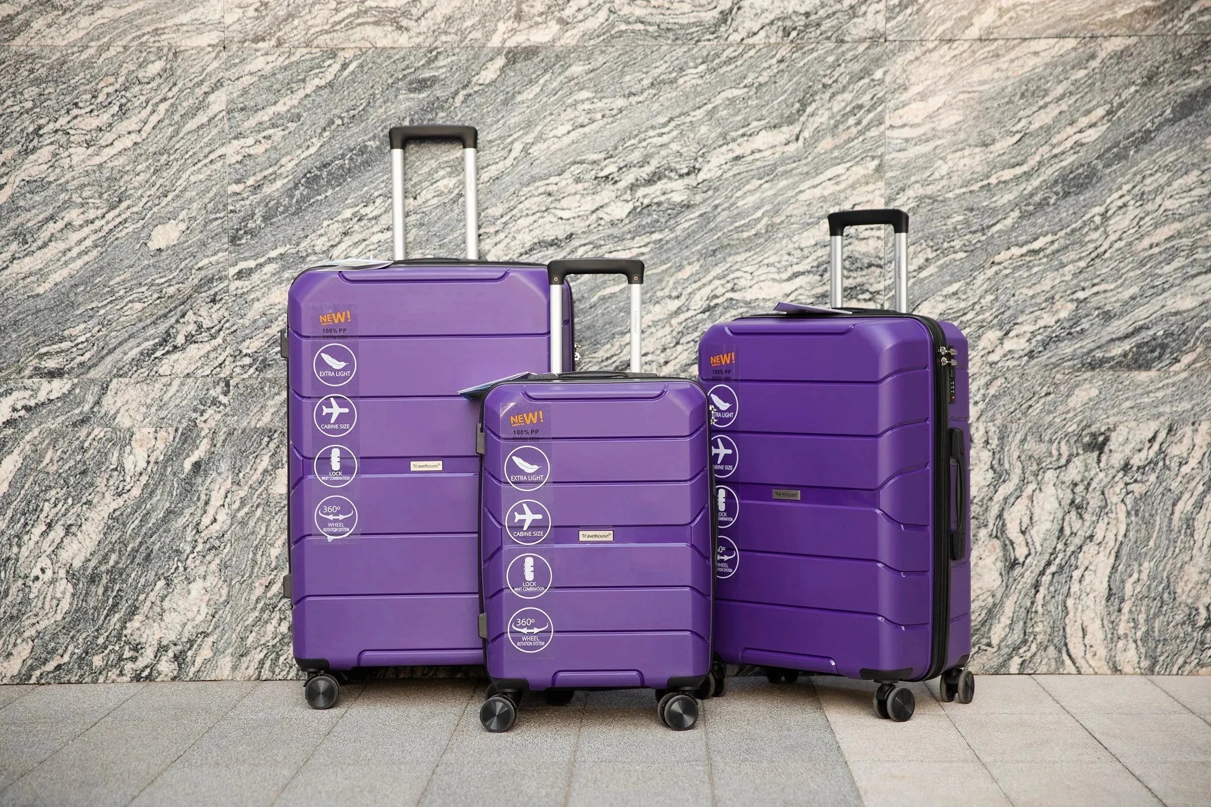 Set of three Nova Mart Travelhouse hardshell luggage suitcases with TSA locks, durable polypropylene material, and modern design.