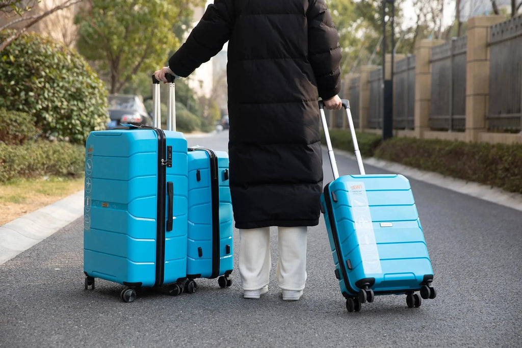 Travelhouse 3-piece hardshell luggage set with TSA locks by Nova Mart, featuring durable polypropylene suitcases with wheels and handles.