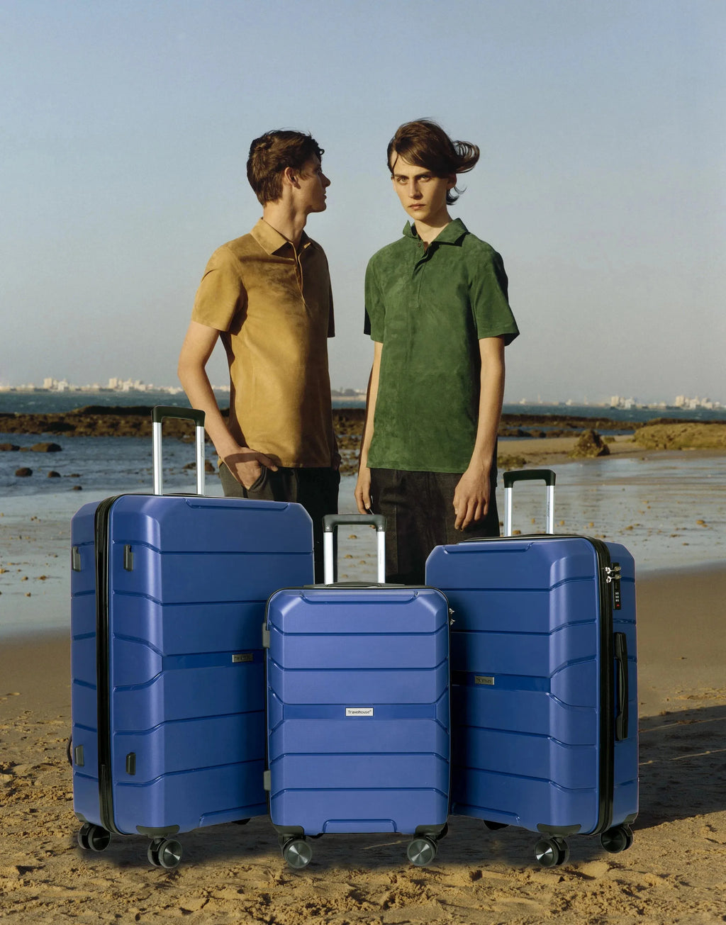 Travelhouse 3-piece PP hardshell luggage set with TSA locks, durable suitcases in black, ideal for travel and storage.