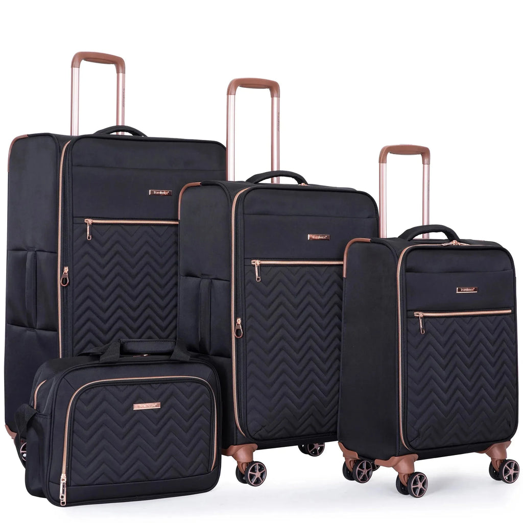 Four-piece Nova Mart Travelhouse softside expandable luggage set with spinner wheels, showing different sizes and black color.