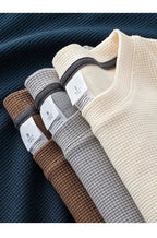 Unisex waffle knit T-shirt in solid color, casual men's fashion by Nova Mart, featuring a relaxed fit and textured fabric.