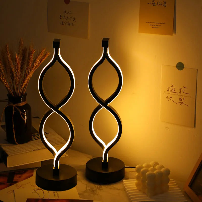 Wave-shaped USB desk lamp by Nova Mart with 3-color dimmable lighting, ideal for modern home or office lighting.