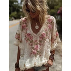 Women's 3D print V-neck artistic top by Nova Mart featuring vibrant, textured fabric and a stylish V-neck design.