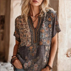 Women's 3D print V-neck artistic top by Nova Mart, featuring a colorful, textured design and a stylish V-neck neckline.