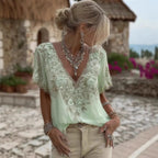 Women's 3D print V-neck artistic top by Nova Mart featuring vibrant, colorful abstract design and lightweight fabric.