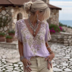 Women's 3D print V-neck artistic top by Nova Mart, featuring vibrant patterns and a stylish V-neck design.
