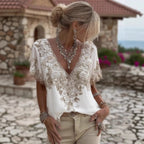 Women's 3D print V-neck artistic top by Nova Mart featuring vibrant, textured fabric and a stylish V-neck design.