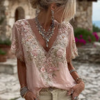 Women's 3D print V-neck artistic top by Nova Mart, featuring vibrant, textured fabric and a stylish V-neck design.