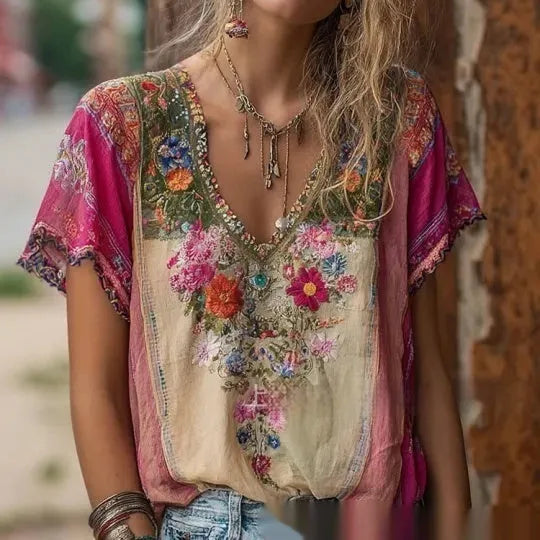Women's 3D print V-neck artistic top by Nova Mart, featuring vibrant, textured fabric and a stylish V-neck design.