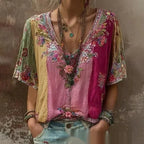 Women's 3D print V-neck artistic top by Nova Mart featuring vibrant, detailed fabric with a modern, stylish design.