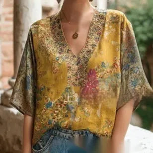 Women's 3D print V-neck artistic top by Nova Mart, featuring vibrant, intricate 3D floral patterns and a stylish V-neck design.