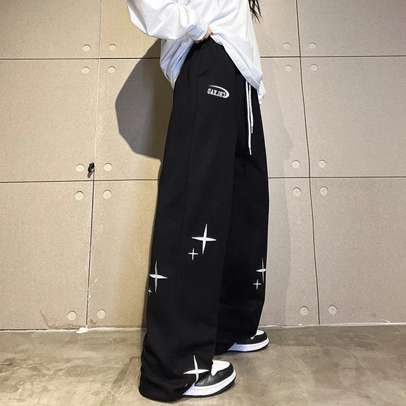 Women's ankle-tied two-purpose sweatpants by Nova Mart showing relaxed fit and tie details at the ankles.