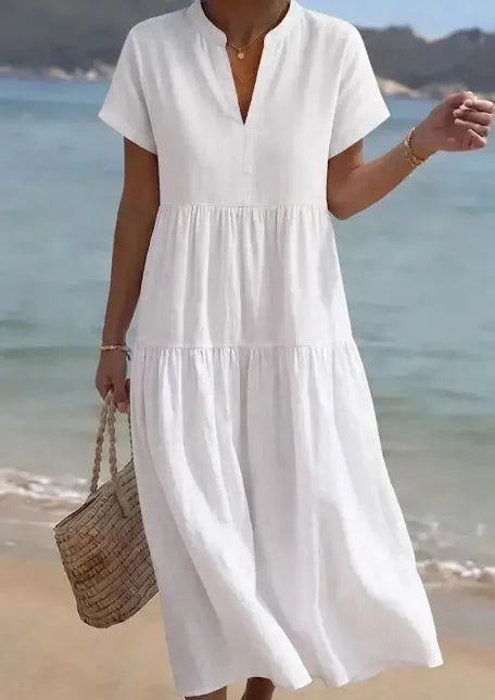 Women's casual dress by Nova Mart, lightweight polyester fabric, relaxed fit, ideal for everyday wear, shown in a natural pose.