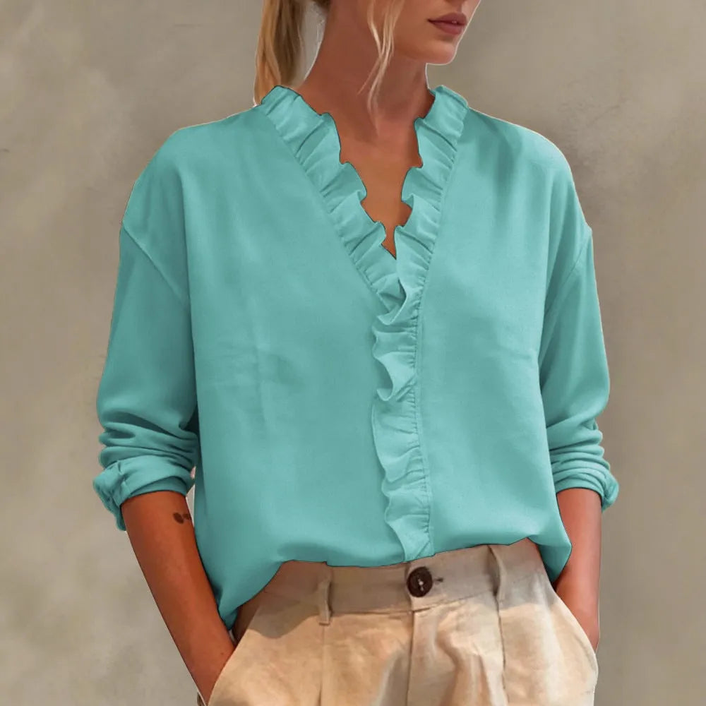 Women's casual long-sleeve V-neck blouse with lace trim by Nova Mart, featuring a lightweight fabric and feminine design.
