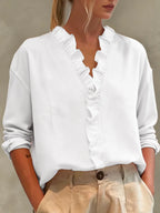 Women's casual long-sleeve V-neck blouse with lace trim, made by Nova Mart, featuring a relaxed fit and elegant design.