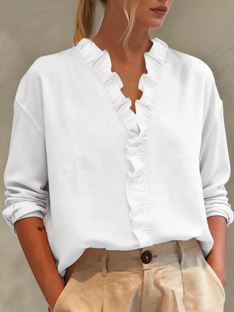 Women's casual long-sleeve V-neck blouse with lace trim, made by Nova Mart, featuring a relaxed fit and elegant design.