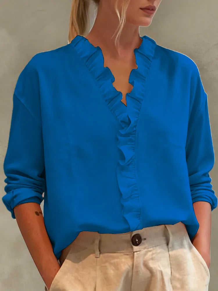 Women's casual long-sleeve V-neck blouse with lace trim by Nova Mart, featuring a relaxed fit and elegant design.