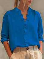 Women's casual long-sleeve V-neck blouse with lace trim by Nova Mart, featuring a relaxed fit and elegant design.