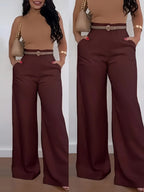 Women's casual solid color flared pants by Nova Mart, shown in a relaxed fit with a stylish flared leg design.