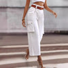 Women's contrast color wide-leg trousers by Nova Mart, featuring a stylish belt and relaxed fit.