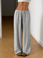 Women's elastic waist lace-up wide-leg casual pants by Nova Mart, shown with a relaxed fit and stylish design.