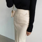 Women's elegant deep split maxi skirt by Nova Mart, flowing fabric with a high slit, perfect for formal and stylish occasions.
