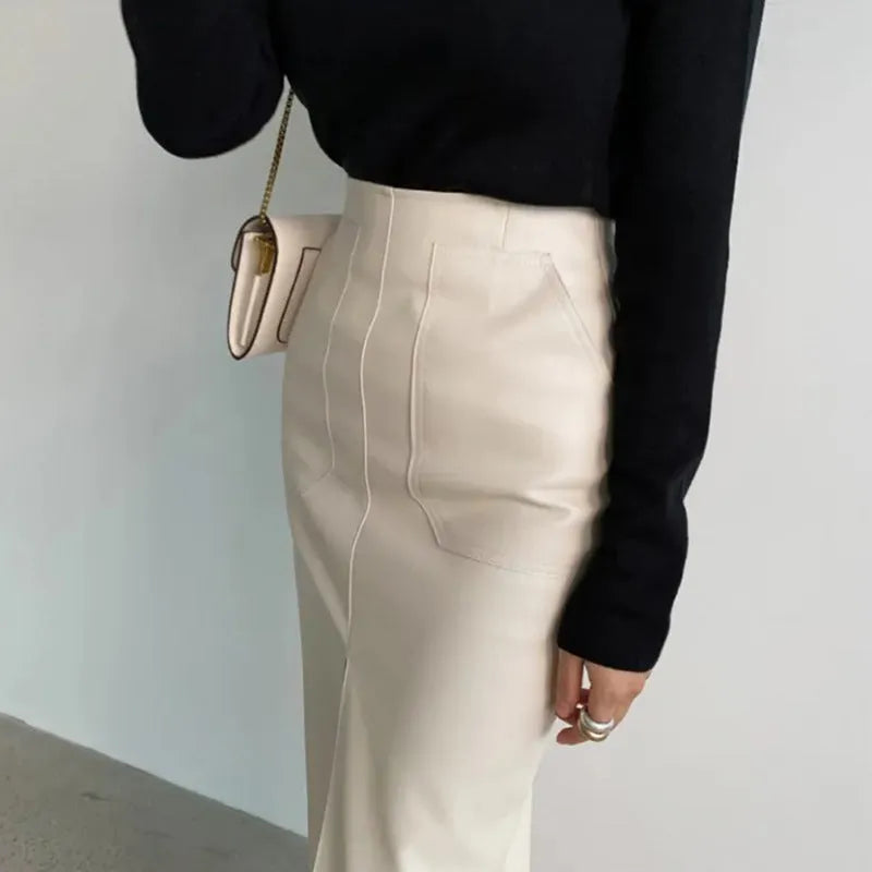 Women's elegant deep split maxi skirt by Nova Mart, flowing fabric with a high slit, perfect for formal and stylish occasions.