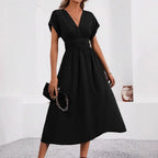 Women's elegant solid-color long dress by Nova Mart, flowing fabric, sleeveless design, perfect for formal occasions.