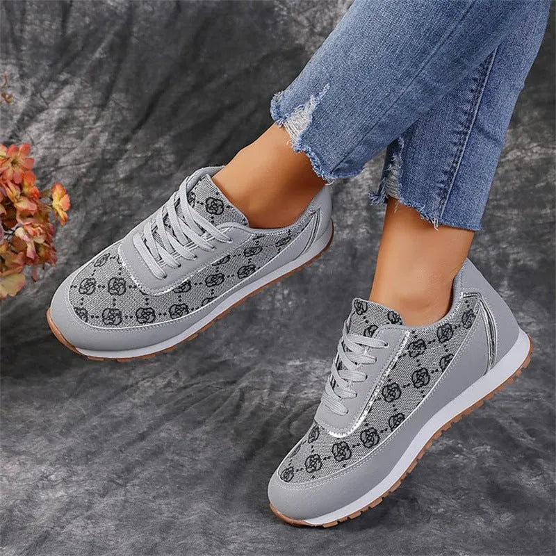 Women's flower print lace-up sneakers by Nova Mart, lightweight walking shoes with colorful floral design and comfortable fit.