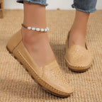 Women's handmade stitching Gommino casual shoes by Nova Mart featuring soft leather and comfortable slip-on design.