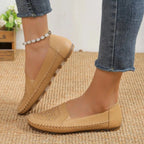 Women's handmade stitching Gommino casual shoes by Nova Mart, featuring soft leather and comfortable slip-on design.